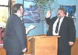Commander William Weidner takes the oath of office